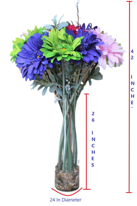 Impressive multicolors giants daisies arrangement with glass clear base. H: 42 In; Diam: 24 In; Base : H:26 In.