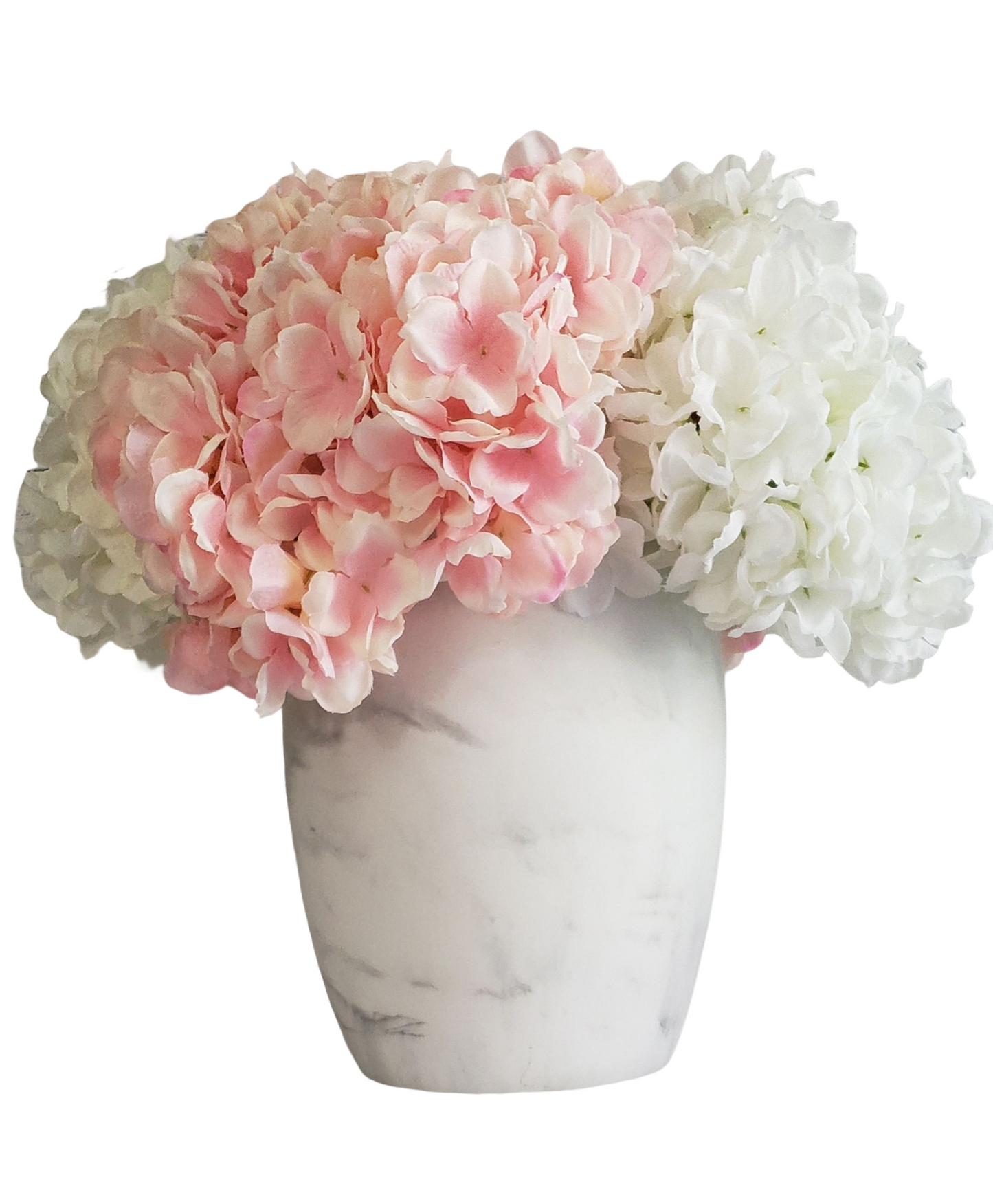 Soft and Exotic Floral arrangement with Pink and White Hydrangea in a White ceramic base. H: 17 In; Diam: 27 In