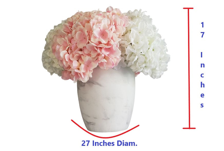 Soft and Exotic Floral arrangement with Pink and White Hydrangea in a White ceramic base. H: 17 In; Diam: 27 In